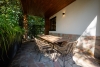 Exklusive Gartenwohnung im Bali-Style mit Haus-im-Haus-Charakter - Terrasse Büro