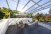Stilvolles Wohnen im Architektenhaus mit privatem Poolparadies in Bestlage - Terrasse mit Glasüberdachung