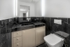 A Class of Its Own - High-End Gartenresidenz in Premium-Neubauvilla - Gäste-WC